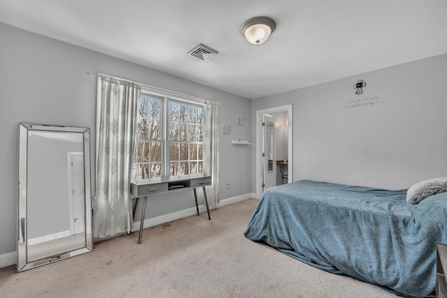 bedroom featuring carpet flooring and baseboards