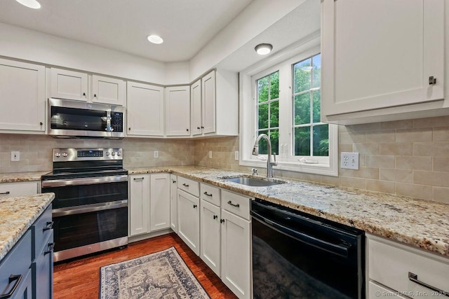 24 Secret Mountain Trl, Canton, CT 06019 - kitchen featuring appliances with stainless steel finishes, a sink, white cabinetry, and dark wood-style floors