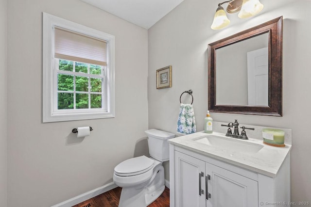 24 Secret Mountain Trl, Canton, CT 06019 - bathroom featuring baseboards, toilet, vanity, and wood finished floors