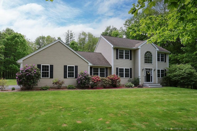 24 Secret Mountain Trl, Canton, CT 06019 - colonial-style house featuring a front yard and roof with shingles