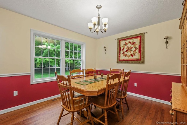 24 Secret Mountain Trl, Canton, CT 06019 - dining room featuring a chandelier, wood finished floors, and baseboards