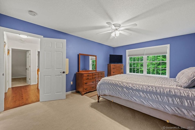 24 Secret Mountain Trl, Canton, CT 06019 - carpeted bedroom featuring a textured ceiling, ceiling fan, and baseboards