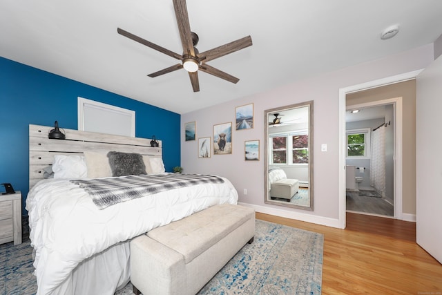 48 Sprucedale Dr, Waterbury, CT 06706 - bedroom with wood finished floors, a ceiling fan, and baseboards