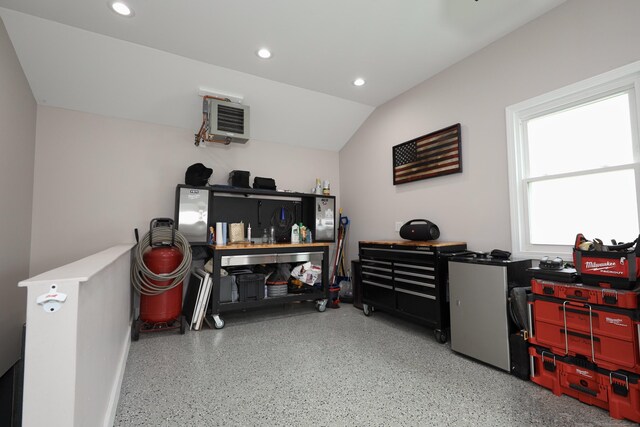 48 Sprucedale Dr, Waterbury, CT 06706 - misc room with speckled floor, recessed lighting, lofted ceiling, and a heating unit