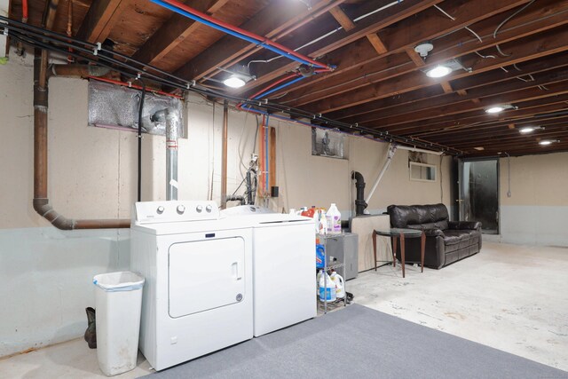 48 Sprucedale Dr, Waterbury, CT 06706 - unfinished basement featuring washer and dryer