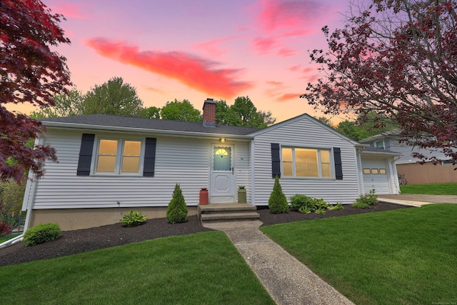 48 Sprucedale Dr, Waterbury, CT 06706 - ranch-style home featuring a chimney, a lawn, and an attached garage