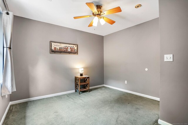 387 New London Tpke, Stonington, CT 06378 - carpeted empty room featuring baseboards and ceiling fan