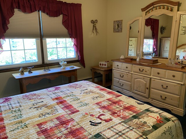 bedroom with a baseboard radiator