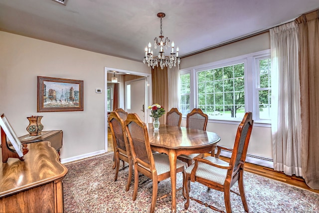 481 Clearbrook Rd, Orange, CT 06477 - dining space with baseboards and a chandelier
