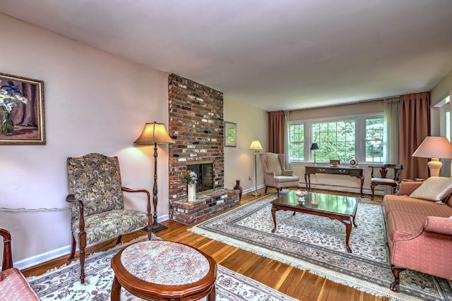 481 Clearbrook Rd, Orange, CT 06477 - living room featuring a fireplace, wood finished floors, and baseboards