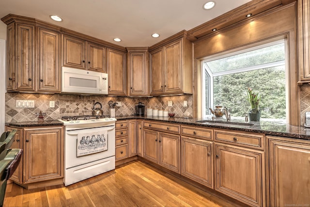 481 Clearbrook Rd, Orange, CT 06477 - kitchen with white appliances, a sink, brown cabinets, and recessed lighting