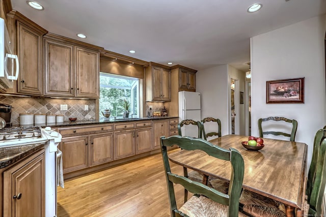 481 Clearbrook Rd, Orange, CT 06477 - kitchen with white appliances, light wood-style floors, decorative backsplash, recessed lighting, and brown cabinetry