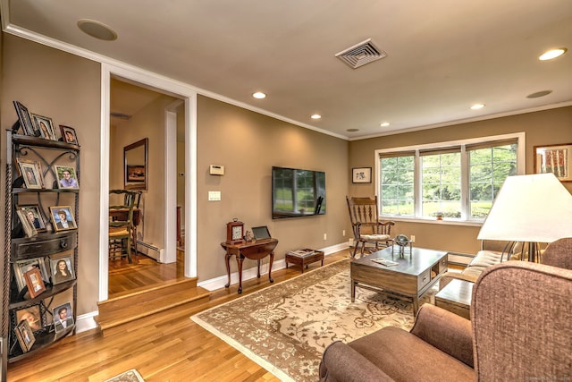 481 Clearbrook Rd, Orange, CT 06477 - living area featuring ornamental molding, baseboard heating, light wood finished floors, recessed lighting, and baseboards