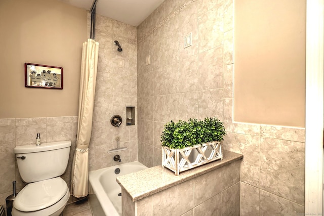 481 Clearbrook Rd, Orange, CT 06477 - bathroom featuring tile walls, toilet, shower / tub combo with curtain, tile patterned flooring, and wainscoting