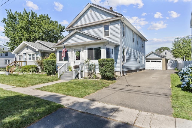 43 Atwater St, Milford, CT 06460 - american foursquare style home featuring an outdoor structure, a detached garage, and a front yard