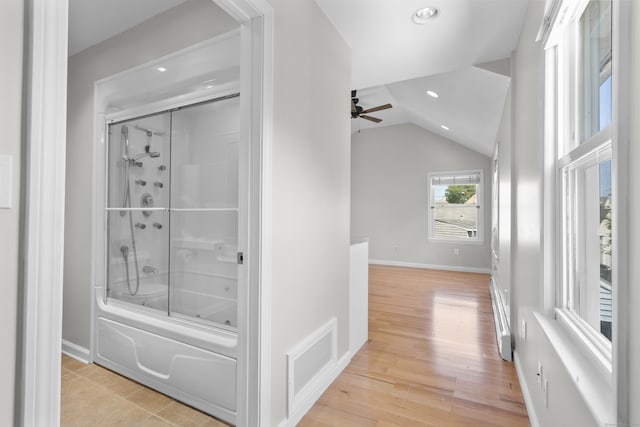 43 Atwater St, Milford, CT 06460 - bathroom with ceiling fan, combined bath / shower with glass door, recessed lighting, lofted ceiling, and a baseboard radiator