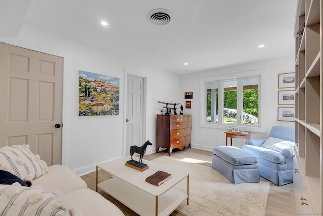 135 Gary Rd, Stamford, CT 06903 - living room with light wood-style floors, recessed lighting, and baseboards