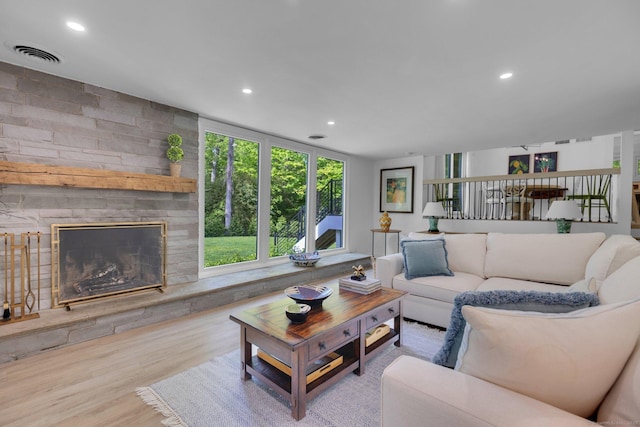 135 Gary Rd, Stamford, CT 06903 - living area with recessed lighting, wood finished floors, and a fireplace