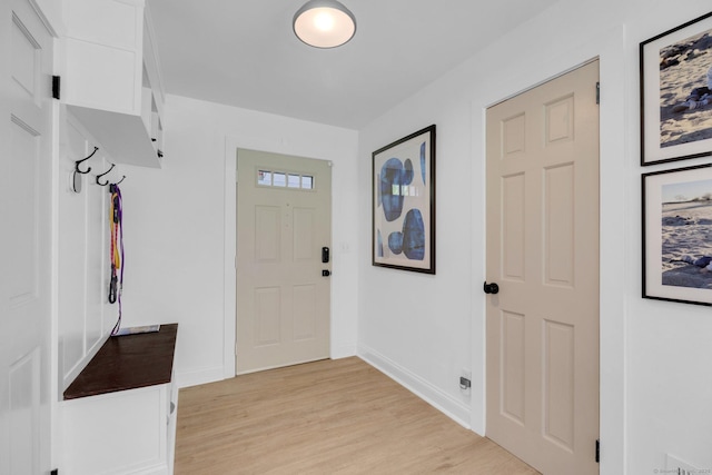 135 Gary Rd, Stamford, CT 06903 - mudroom featuring light wood-style flooring and baseboards