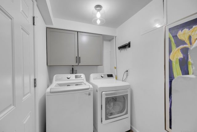 135 Gary Rd, Stamford, CT 06903 - laundry area with cabinet space and washing machine and clothes dryer