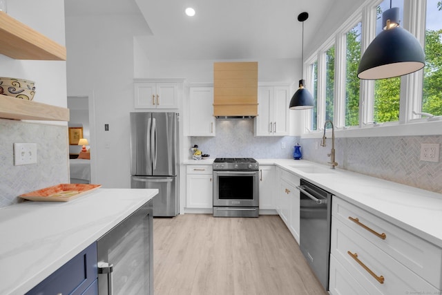 135 Gary Rd, Stamford, CT 06903 - kitchen with stainless steel appliances, open shelves, a sink, tasteful backsplash, and recessed lighting