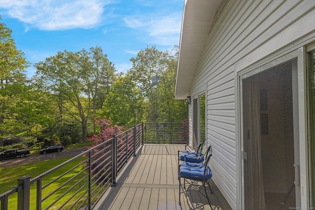 135 Gary Rd, Stamford, CT 06903 - wooden deck featuring a lawn