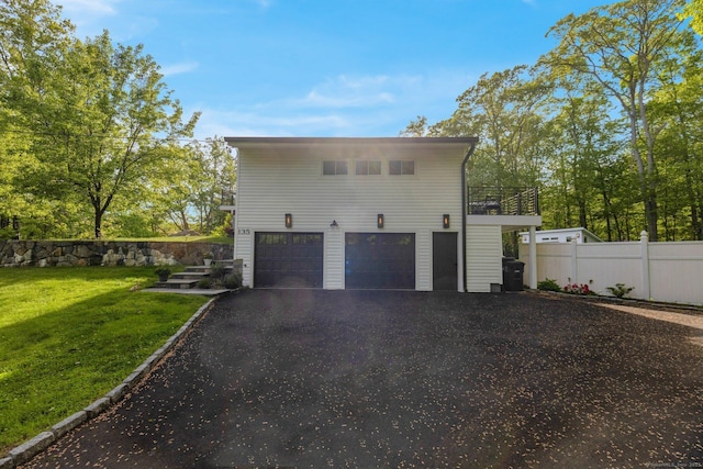 135 Gary Rd, Stamford, CT 06903 - view of home's exterior featuring a garage and driveway