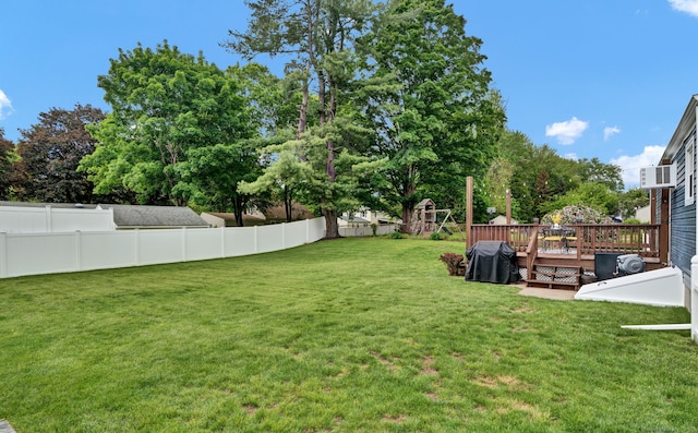 13 Carol St, Enfield, CT 06082 - fenced backyard featuring a deck
