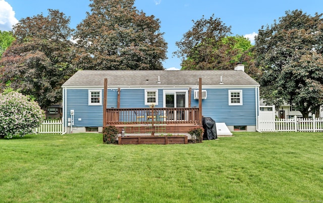 13 Carol St, Enfield, CT 06082 - rear view of house featuring a deck, a chimney, a wall unit AC, and roof with shingles
