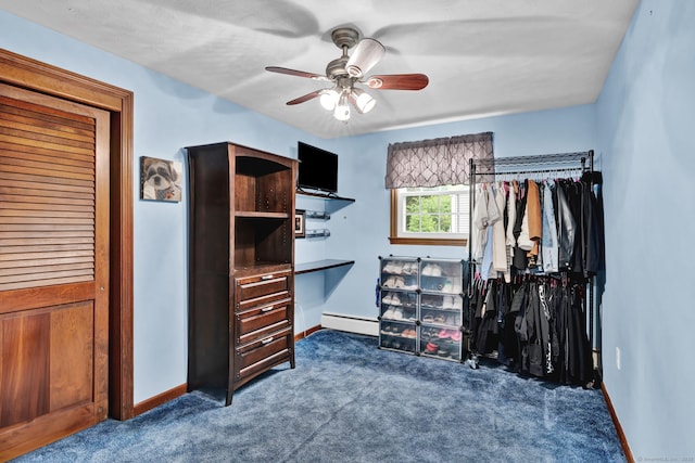 13 Carol St, Enfield, CT 06082 - spacious closet featuring carpet flooring, a ceiling fan, and a baseboard radiator
