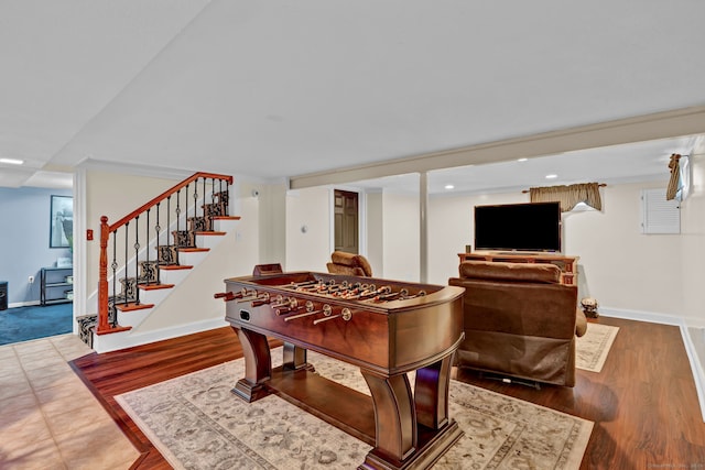 13 Carol St, Enfield, CT 06082 - recreation room with wood finished floors and recessed lighting
