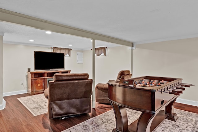 13 Carol St, Enfield, CT 06082 - playroom featuring dark wood-style floors and recessed lighting