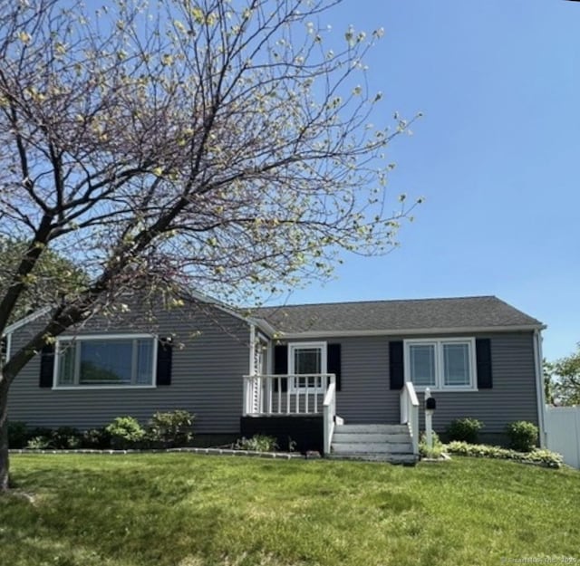 single story home featuring a deck