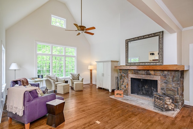 34 Avalon Dr, Middlebury, CT 06762 - living room with high vaulted ceiling, ceiling fan, a fireplace, wood finished floors, and baseboards