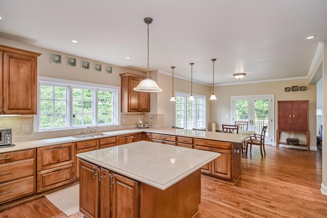 34 Avalon Dr, Middlebury, CT 06762 - kitchen featuring a sink, light countertops, a center island, a peninsula, and recessed lighting