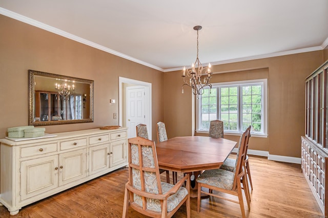 34 Avalon Dr, Middlebury, CT 06762 - dining space with a chandelier, light wood finished floors, crown molding, and baseboards