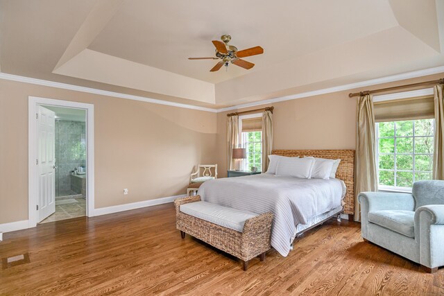 34 Avalon Dr, Middlebury, CT 06762 - bedroom with a tray ceiling, wood finished floors, baseboards, crown molding, and ensuite bathroom