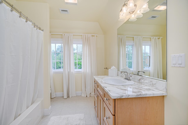 34 Avalon Dr, Middlebury, CT 06762 - bathroom with vanity, tile patterned flooring, baseboards, a chandelier, and shower / tub combo