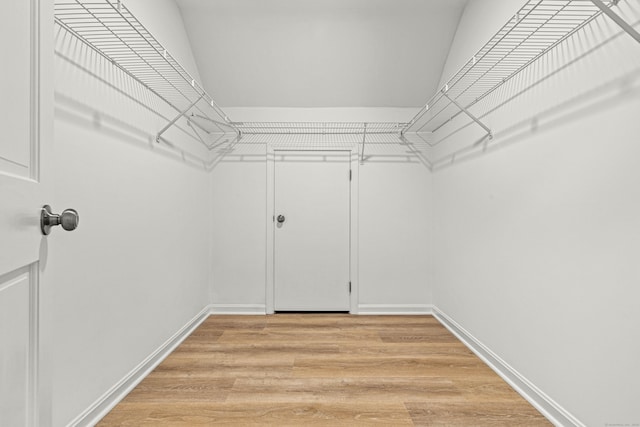 34 Willow Ln, East Lyme, CT 06333 - spacious closet with light wood-style floors