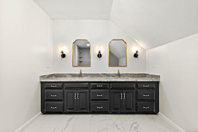 34 Willow Ln, East Lyme, CT 06333 - bathroom with marble look tile flooring, double vanity, and baseboards