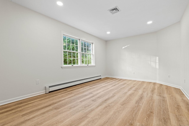 34 Willow Ln, East Lyme, CT 06333 - empty room featuring baseboard heating, light wood-type flooring, recessed lighting, and baseboards