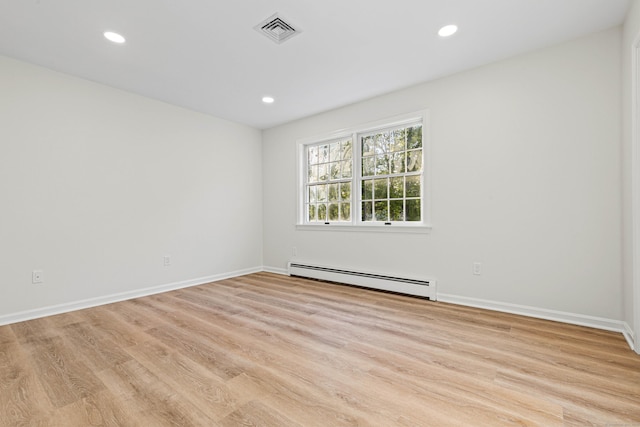 34 Willow Ln, East Lyme, CT 06333 - empty room with baseboard heating, light wood-style floors, recessed lighting, and baseboards