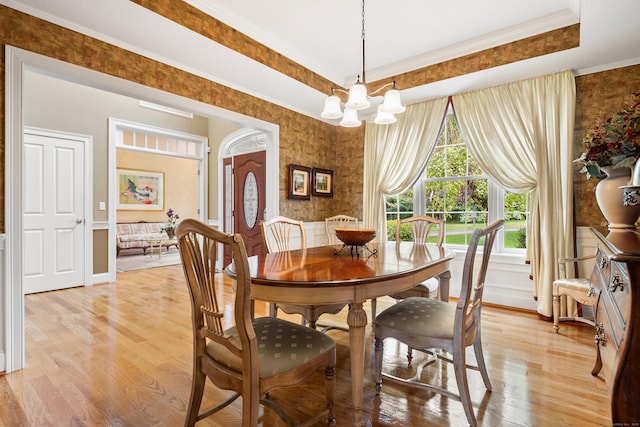 33 Pease Farm Rd, Ellington, CT 06029 - dining area featuring a chandelier, light wood finished floors, and crown molding