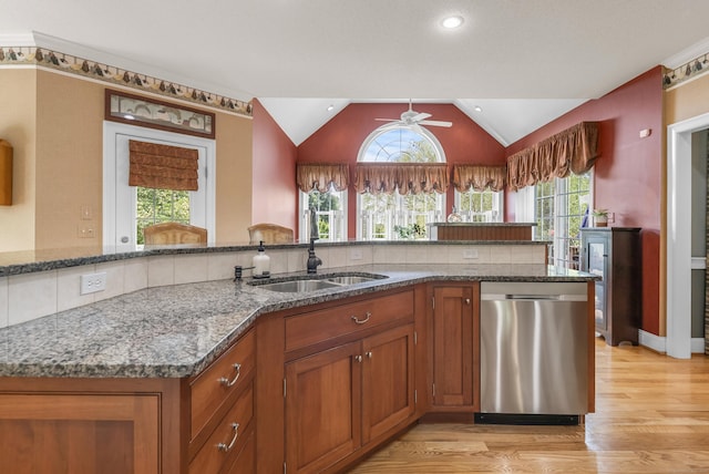 33 Pease Farm Rd, Ellington, CT 06029 - kitchen featuring dishwasher, light wood finished floors, brown cabinets, vaulted ceiling, and stone counters