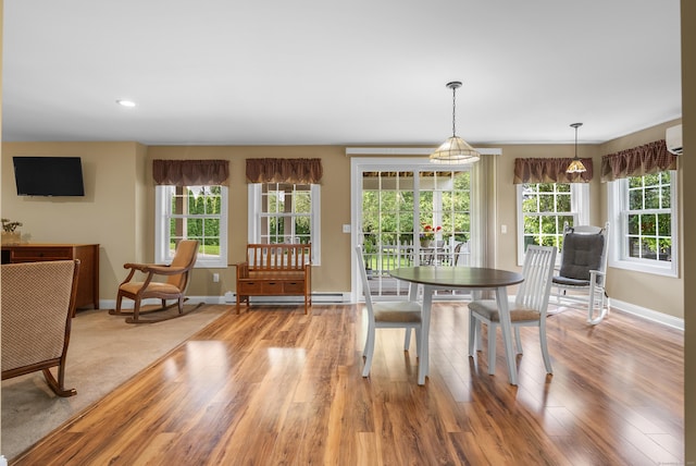 33 Pease Farm Rd, Ellington, CT 06029 - dining space with a baseboard heating unit, light wood-style flooring, and recessed lighting