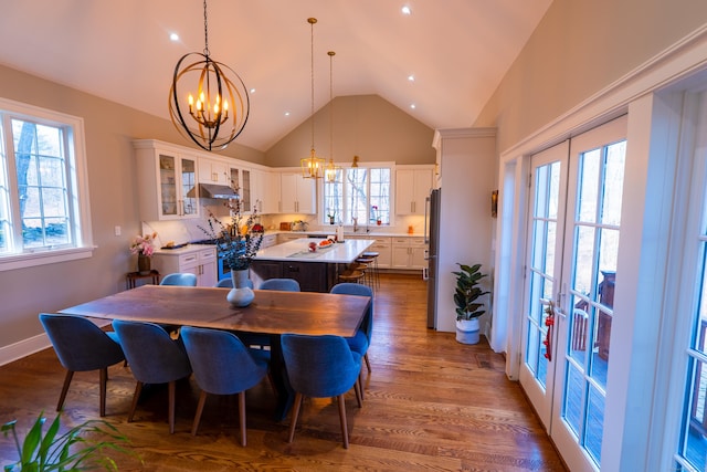 471 Newtown Tpke, Redding, CT 06896 - dining room with a chandelier, dark wood-style flooring, plenty of natural light, high vaulted ceiling, and recessed lighting