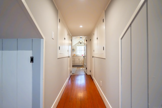 471 Newtown Tpke, Redding, CT 06896 - hallway featuring baseboards, wood-type flooring, and recessed lighting