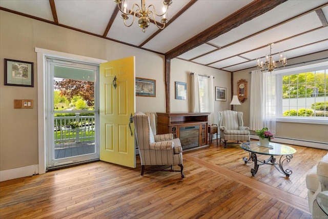 255 Killingly Rd, Pomfret, CT 06259 - sitting room with a chandelier, baseboard heating, and hardwood / wood-style flooring