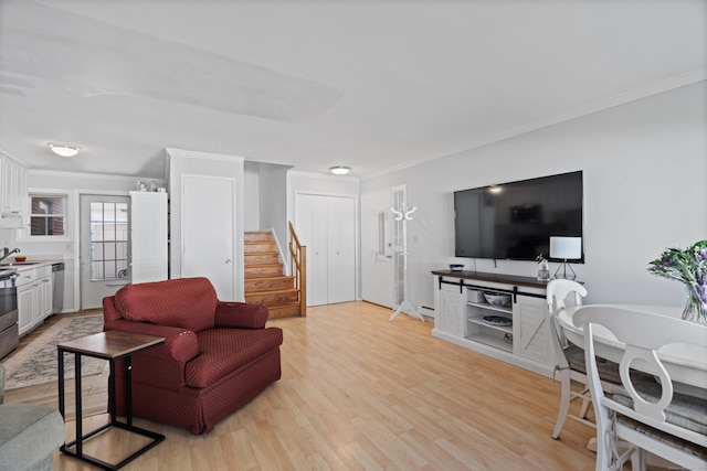 211 W Walk Unit 211, West Haven, CT 06516 - living area with stairs, ornamental molding, and light wood finished floors