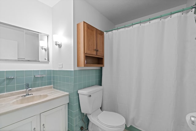 211 W Walk Unit 211, West Haven, CT 06516 - full bathroom with toilet, tile walls, vanity, wainscoting, and a shower with curtain